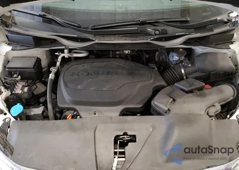 2021 Honda Odyssey Touring from USA, damaged, VIN 5FNRL6H83MB007365